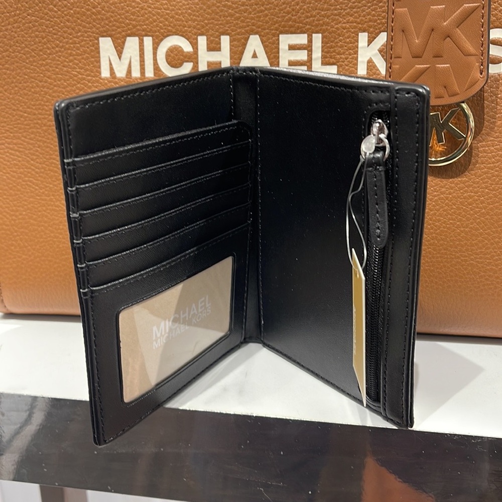 Michael Kors Jet Set Travel Passport Wallet
Black Signature/Silver-Tone Hardware - Picture 3 of 16